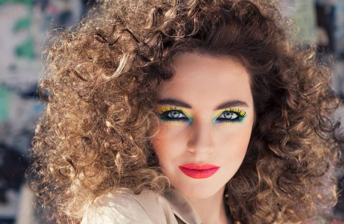 Reviving ’80s Hairstyles: From Neon Curls to Modern Wellness