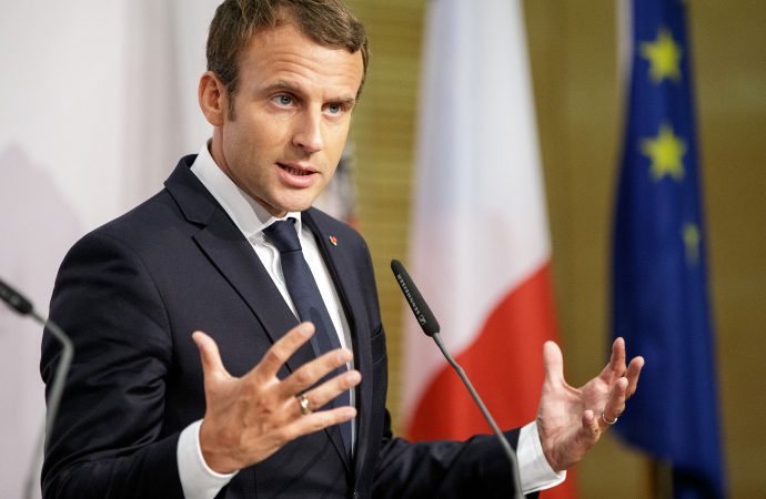 Macron Emerges Victorious: Salvaging Immigration Law in Pivotal Parliamentary Vote