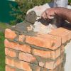 Protect Your Home from Top Down: Chimney Repair and Cap Services