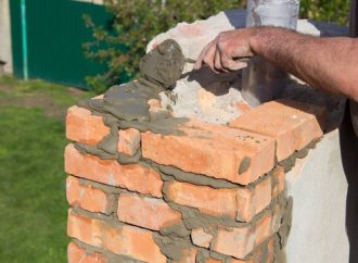 Protect Your Home from Top Down: Chimney Repair and Cap Services
